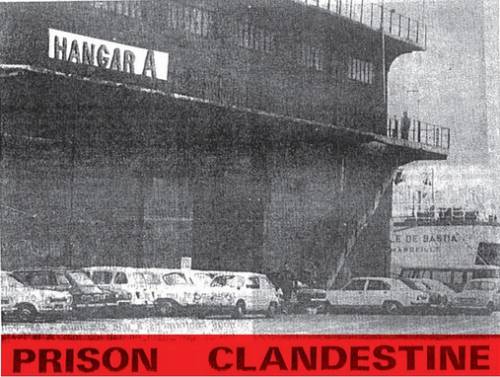 Photo de l'extérieur de la prison d'Arenc, avec un panneau indiquant Hangar A